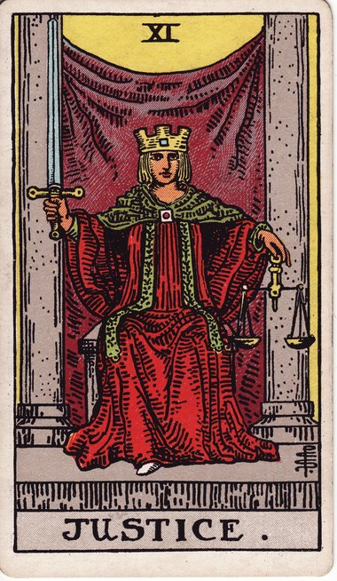Justice from the 1909 Waite-Smith tarot, drawn by Pamela Colman Smith